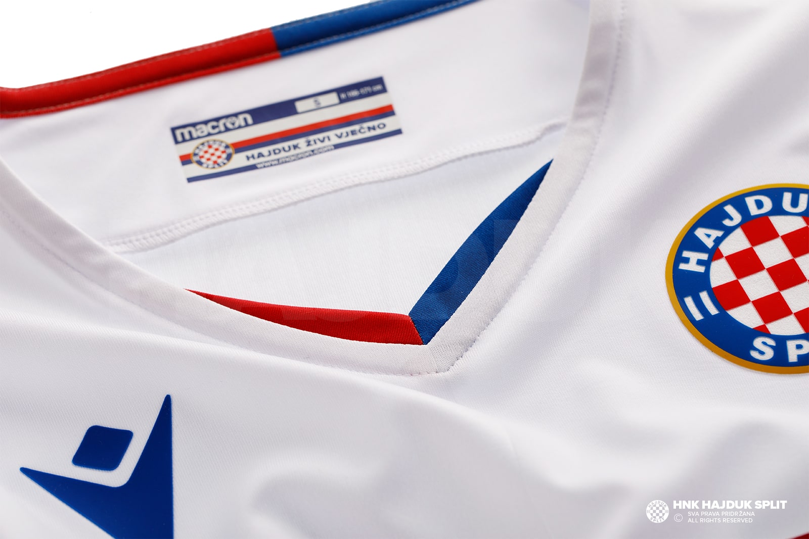 The Hajduk Split Away shirt 2017/18 has vertical red and blue bands with  gold details. The Macron logo stands out in white on the top right-hand  side of, By Macron