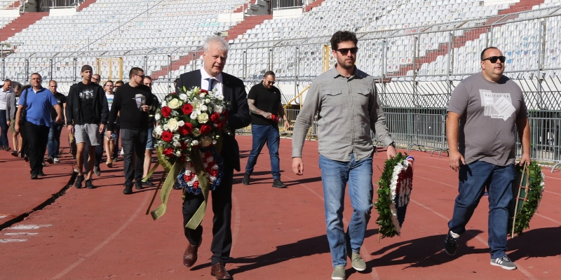 Wreaths laid and candles lit by the North stand memorial at Poljud